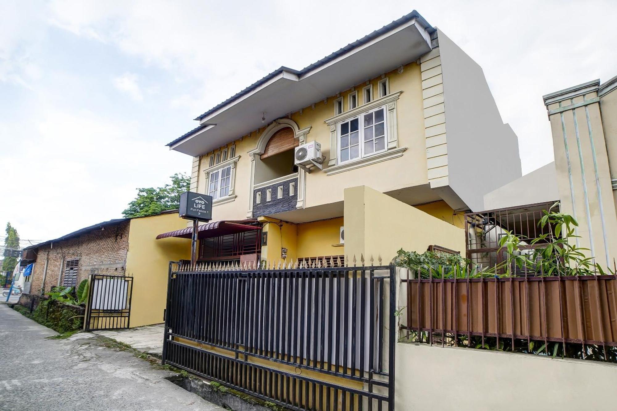 Oyo 91199 Felicia Homestay Medan Bagian luar foto